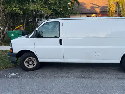 White service van parked in a driveway, ready to head to the next job